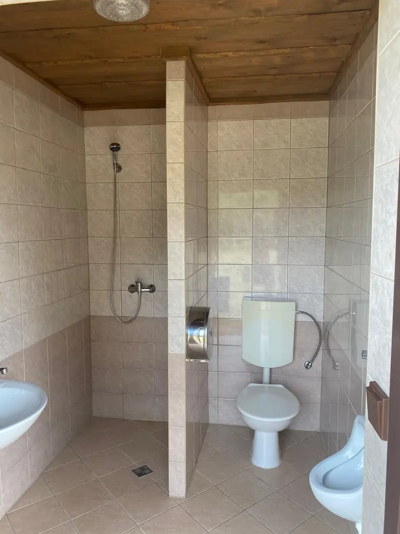 Pánské sprchy + WC